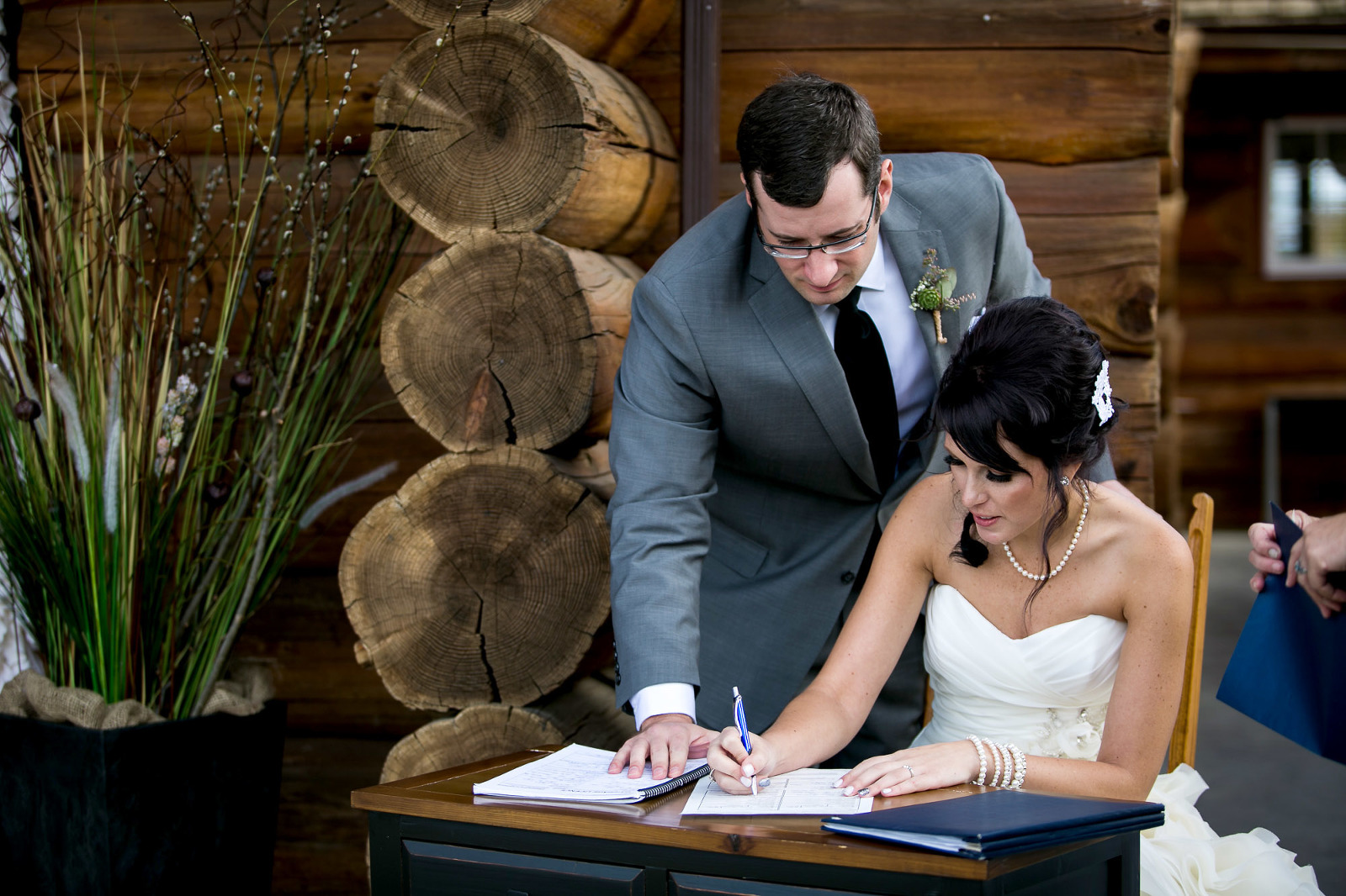 bride and groom signing of the registry